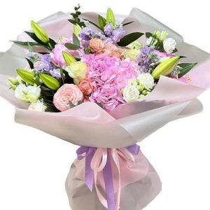 Елегантна квіткова композиція з лілій та гортензії